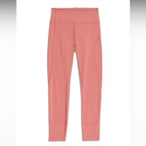 Lululemon In Movement 7/8 tight. Size 4. Color: Rustic Coral. Only worn once.
